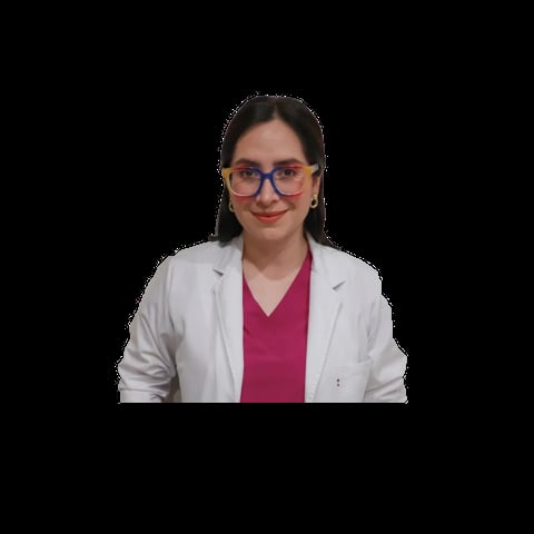 Woman wearing glasses, white blazer, and magenta top against black background