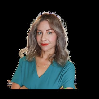 Professional headshot of a woman with shoulder-length gray hair wearing a teal v-neck shirt against a black background